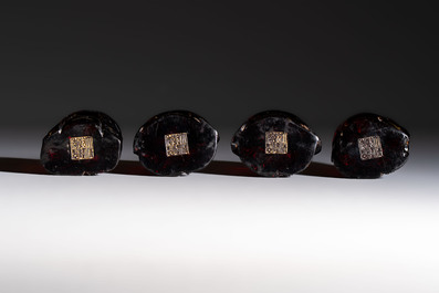 A rare complete set of 12 Chinese cherry amber 'Zodiac' figures on wooden stands, Qianlong mark, Republic