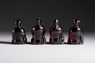 A rare complete set of 12 Chinese cherry amber 'Zodiac' figures on wooden stands, Qianlong mark, Republic