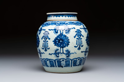 A Chinese blue and white covered jar and two polychrome-decorated jarlets with wooden covers, 18/19th C.