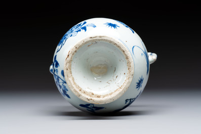 A Chinese blue and white 'Floral' ewer, Transitional period