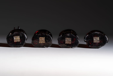 A rare complete set of 12 Chinese cherry amber 'Zodiac' figures on wooden stands, Qianlong mark, Republic