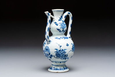 A Chinese blue and white 'Floral' ewer, Transitional period