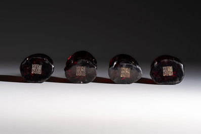 A rare complete set of 12 Chinese cherry amber 'Zodiac' figures on wooden stands, Qianlong mark, Republic