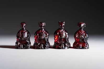 A rare complete set of 12 Chinese cherry amber 'Zodiac' figures on wooden stands, Qianlong mark, Republic