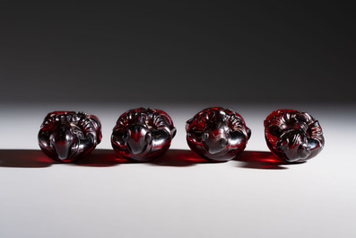 A rare complete set of 12 Chinese cherry amber 'Zodiac' figures on wooden stands, Qianlong mark, Republic