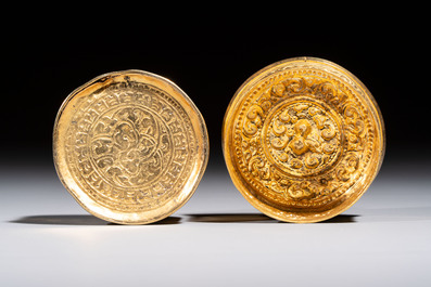 A fine Tibetan gilt-bronze box and cover with repouss&eacute; scroll decoration, 18th C.