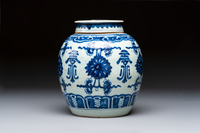A Chinese blue and white covered jar and two polychrome-decorated jarlets with wooden covers, 18/19th C.