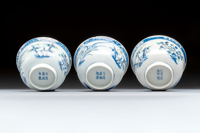 Three Chinese enamelled blue and white covered bowls on stands and a famille rose vase, Kangxi and Tongzhi mark, 19/20th C.