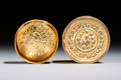 A fine Tibetan gilt-bronze box and cover with repouss&eacute; scroll decoration, 18th C.