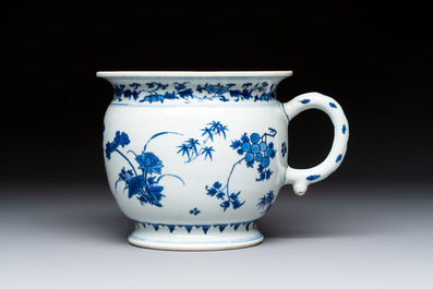 A Chinese blue and white 'Floral' chamber pot, Transitional period