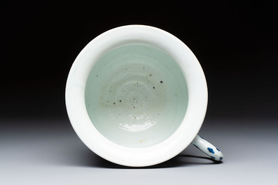 A Chinese blue and white 'Floral' chamber pot, Transitional period