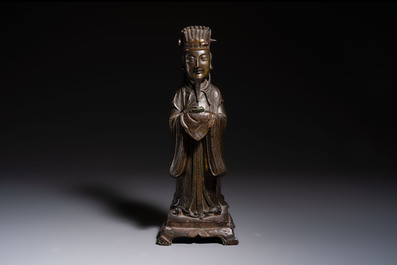 A Chinese bronze figure of an official, Ming
