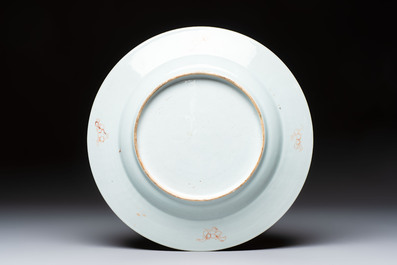 Four Chinese famille rose plates and a dish with floral design, Yongzheng/Qianlong