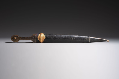 Two Caucasian Kindjal daggers with horn hilts, one with a gilt-iron-mounted leather scabbard and one with a metal-mounted velvet scabbard, 18/19th C