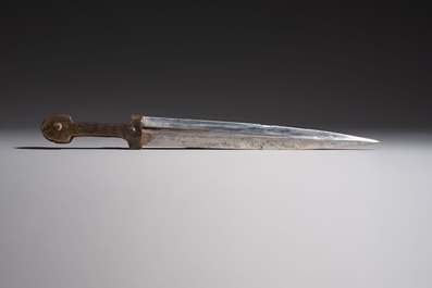 Two Caucasian Kindjal daggers with horn hilts, one with a gilt-iron-mounted leather scabbard and one with a metal-mounted velvet scabbard, 18/19th C