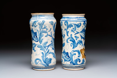 A pair of unusual blue, white and polychrome Italian maiolica 'fish' albarelli, 18th C.