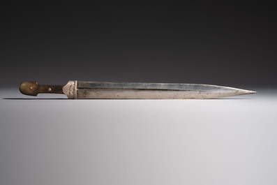 Two Caucasian Kindjal daggers with horn hilts, one with a gilt-iron-mounted leather scabbard and one with a metal-mounted velvet scabbard, 18/19th C