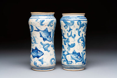 A pair of unusual blue, white and polychrome Italian maiolica 'fish' albarelli, 18th C.