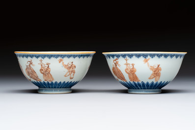 A pair of Chinese blue and white iron-red-decorated 'Three Star Gods' bowls, Qianlong mark and of the period