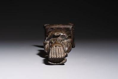 A Chinese bronze figure of an official, Ming