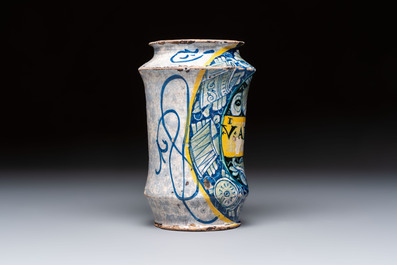 A polychrome Italian maiolica 'a trofei' albarello, inscribed V. APOSTL, Deruta, late 16th C.