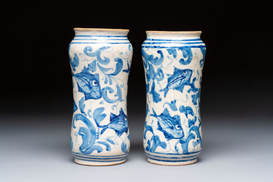 A pair of unusual blue, white and polychrome Italian maiolica 'fish' albarelli, 18th C.