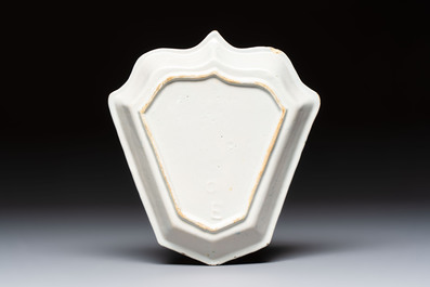 A fine blue and white Dutch Delft leaf-shaped dish with travellers in a landscape, early 18th C.