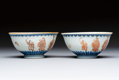 A pair of Chinese blue and white iron-red-decorated 'Three Star Gods' bowls, Qianlong mark and of the period