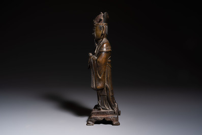A Chinese bronze figure of an official, Ming