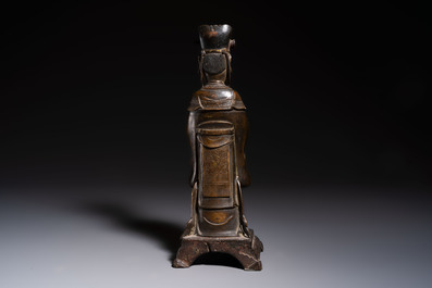A Chinese bronze figure of an official, Ming