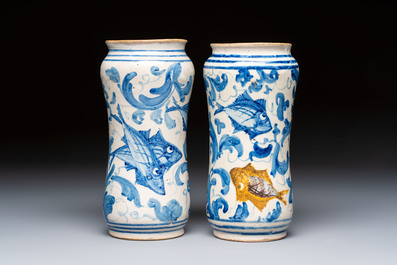 A pair of unusual blue, white and polychrome Italian maiolica 'fish' albarelli, 18th C.