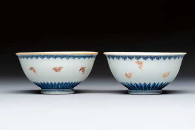 A pair of Chinese blue and white iron-red-decorated 'Three Star Gods' bowls, Qianlong mark and of the period