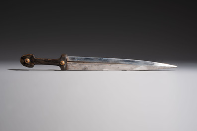 Two Caucasian Kindjal daggers with horn hilts, one with a gilt-iron-mounted leather scabbard and one with a metal-mounted velvet scabbard, 18/19th C