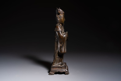A Chinese bronze figure of an official, Ming