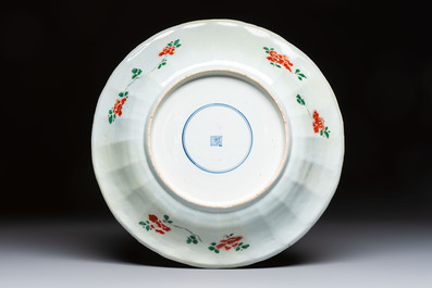 A large Chinese famille verte 'Pavilion with Birds among Flowering Branches' dish, Kangxi
