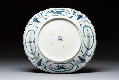 A rare Japanese Kutani oval 'Dutchmen' dish, seal mark, Edo, 17/18th C.