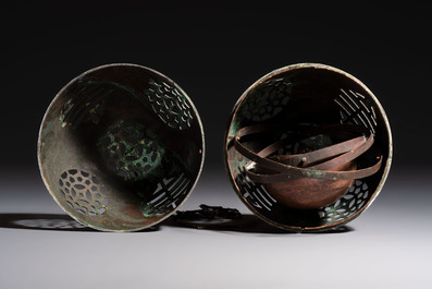 A Chinese or Vietnamese silver-inlaid copper reticulated spherical censer and a silver- and copper-inlaid bronze tripod censer, 19th C.