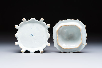 A blue and white Dutch Delft tobacco box and cover with a boy holding tobacco, 18th C.