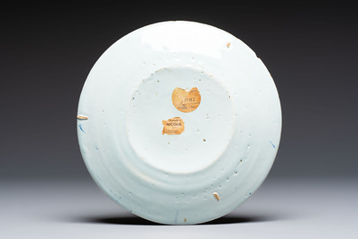 A fine blue and white Dutch Delft chinoiserie dish in the Transitional style, 17th C.
