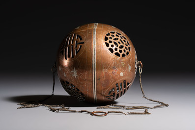 A Chinese or Vietnamese silver-inlaid copper reticulated spherical censer and a silver- and copper-inlaid bronze tripod censer, 19th C.