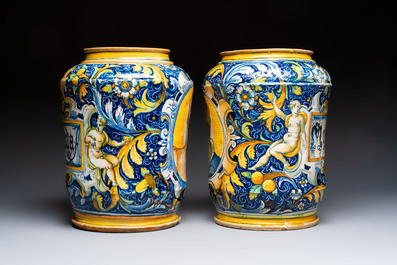 An exceptional pair of large polychrome Italian maiolica albarelli with a bust of a man and a woman, Venice, workshop of Maestro Domenico, mid 16th C.