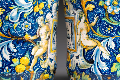 An exceptional pair of large polychrome Italian maiolica albarelli with a bust of a man and a woman, Venice, workshop of Maestro Domenico, mid 16th C.