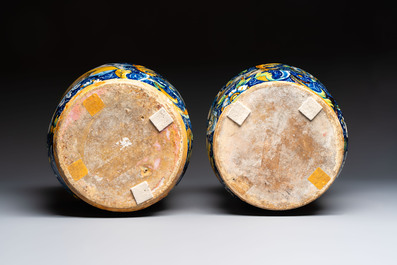 An exceptional pair of large polychrome Italian maiolica albarelli with a bust of a man and a woman, Venice, workshop of Maestro Domenico, mid 16th C.