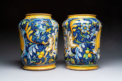 An exceptional pair of large polychrome Italian maiolica albarelli with a bust of a man and a woman, Venice, workshop of Maestro Domenico, mid 16th C.