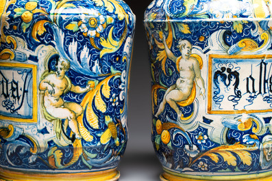 An exceptional pair of large polychrome Italian maiolica albarelli with a bust of a man and a woman, Venice, workshop of Maestro Domenico, mid 16th C.
