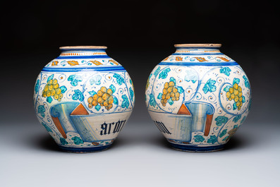 A pair of large polychrome Italian maiolica drug jars with grapevines, Venice, 3rd quarter 16th C.