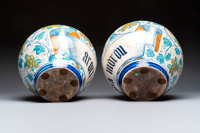 A pair of large polychrome Italian maiolica drug jars with grapevines, Venice, 3rd quarter 16th C.