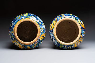 An exceptional pair of large polychrome Italian maiolica albarelli with a bust of a man and a woman, Venice, workshop of Maestro Domenico, mid 16th C.