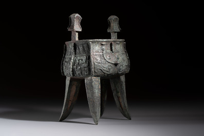 A Chinese archaic bronze wine vessel with owl design, Jia 斝, late Shang