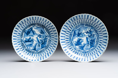 Four Chinese 'Kraak' blue and white plates with a bird on a rock, Wanli